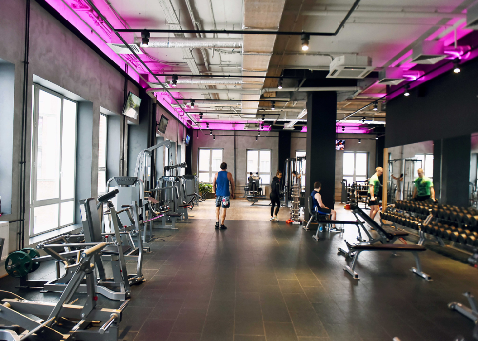 People working out in a hotel gym.