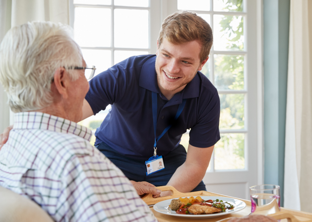 Male nurse speaking to patient.