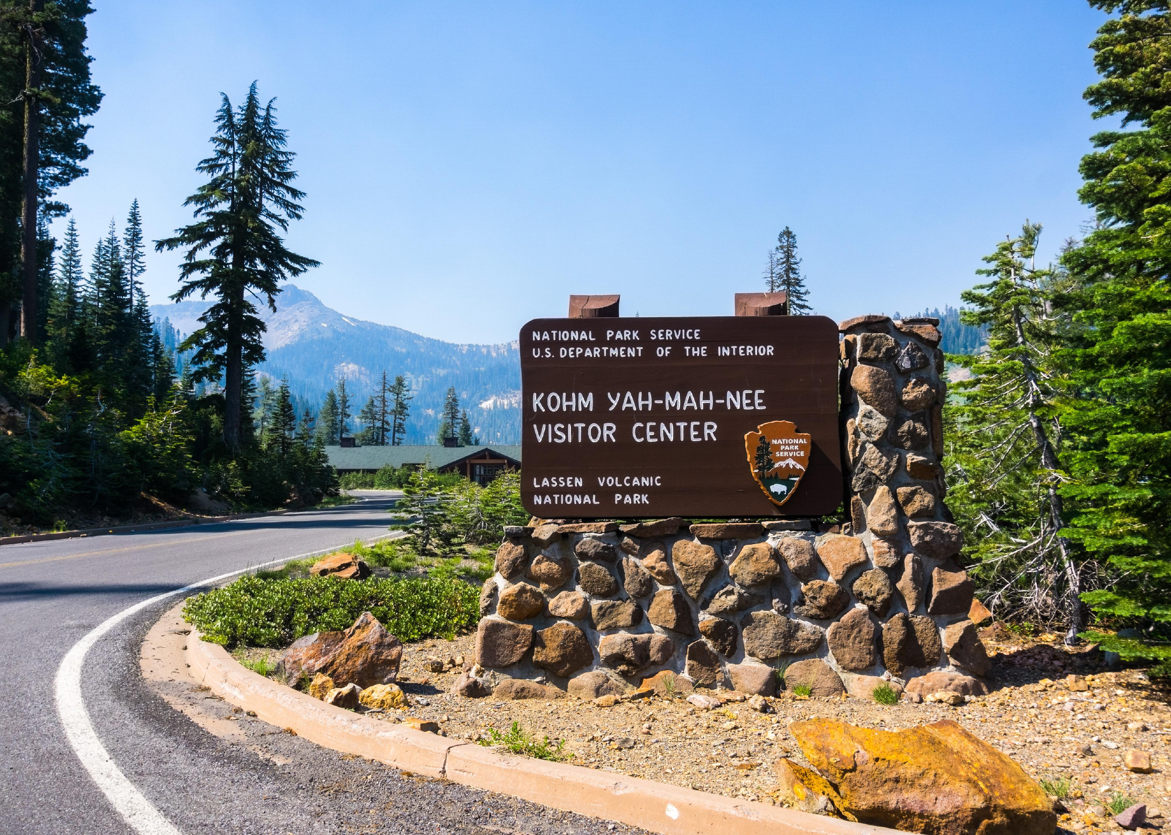 Posted sign for Kohm Yah-mah-nee Visitor Center in Lassen Volcanic National Park.