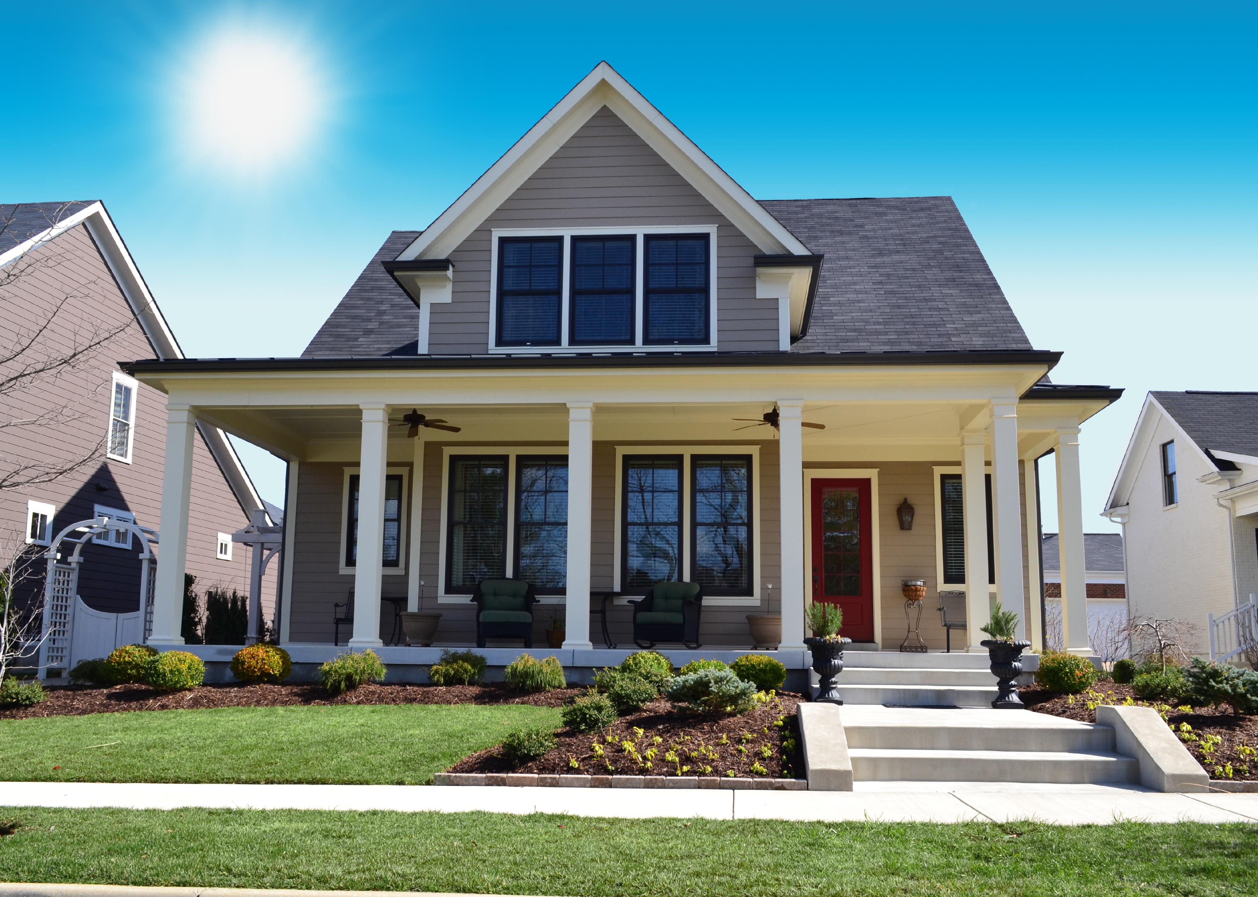 A small suburban home with porch.