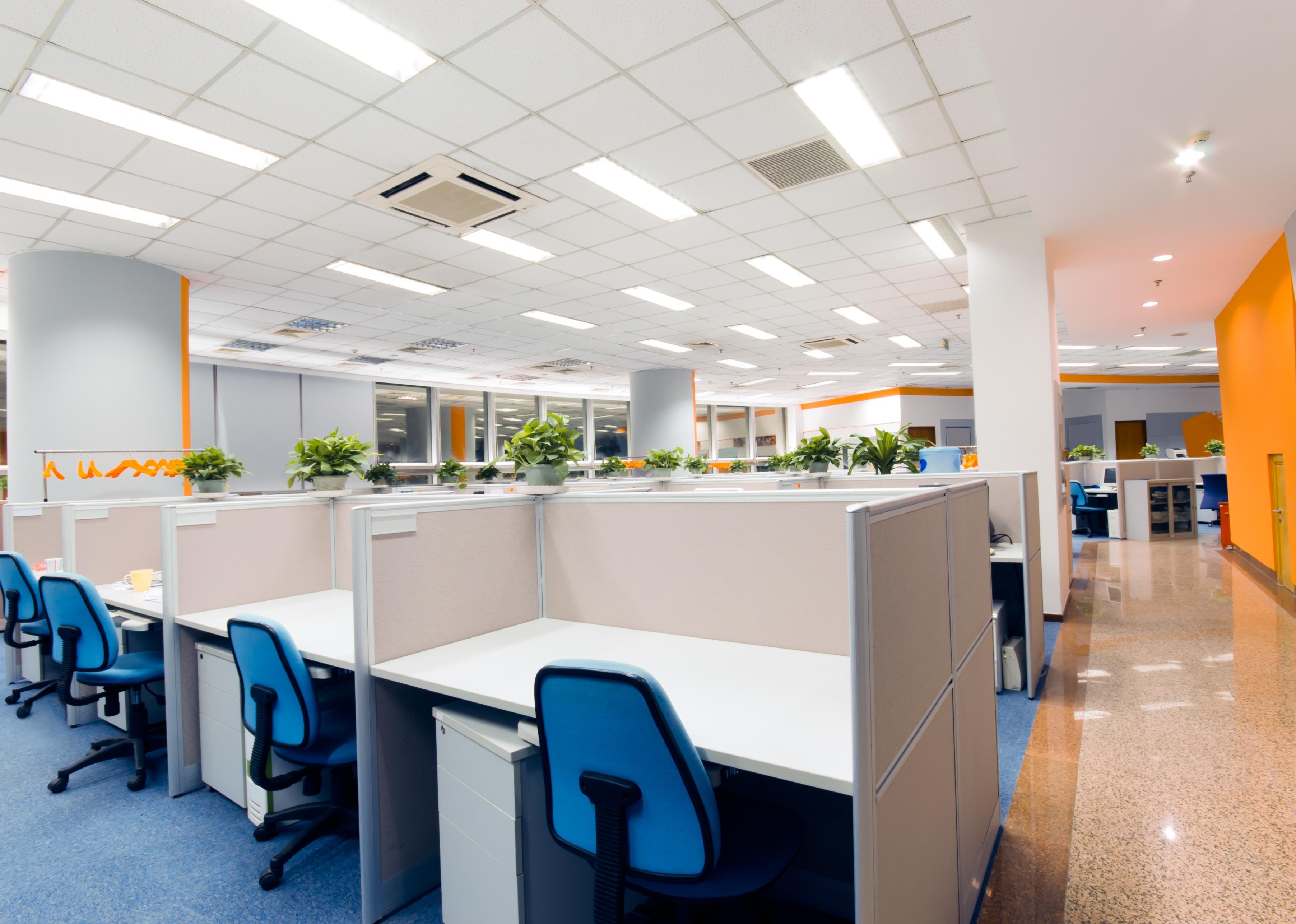 Empty office cubicles and chairs.