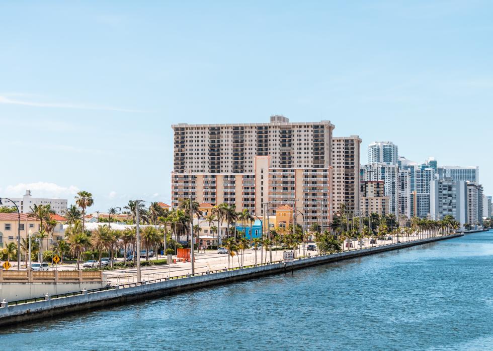 Buildings and road along waterway.