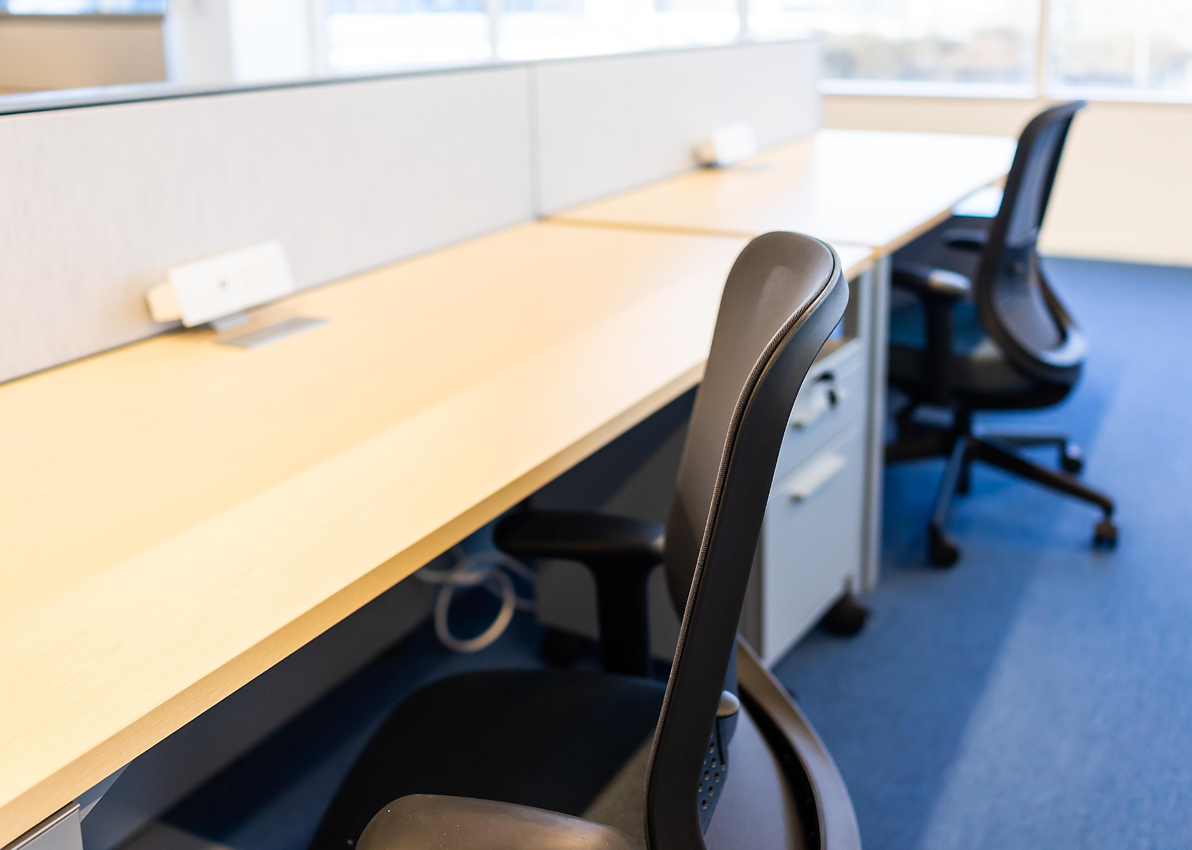 Empty office room with closeup of chair.