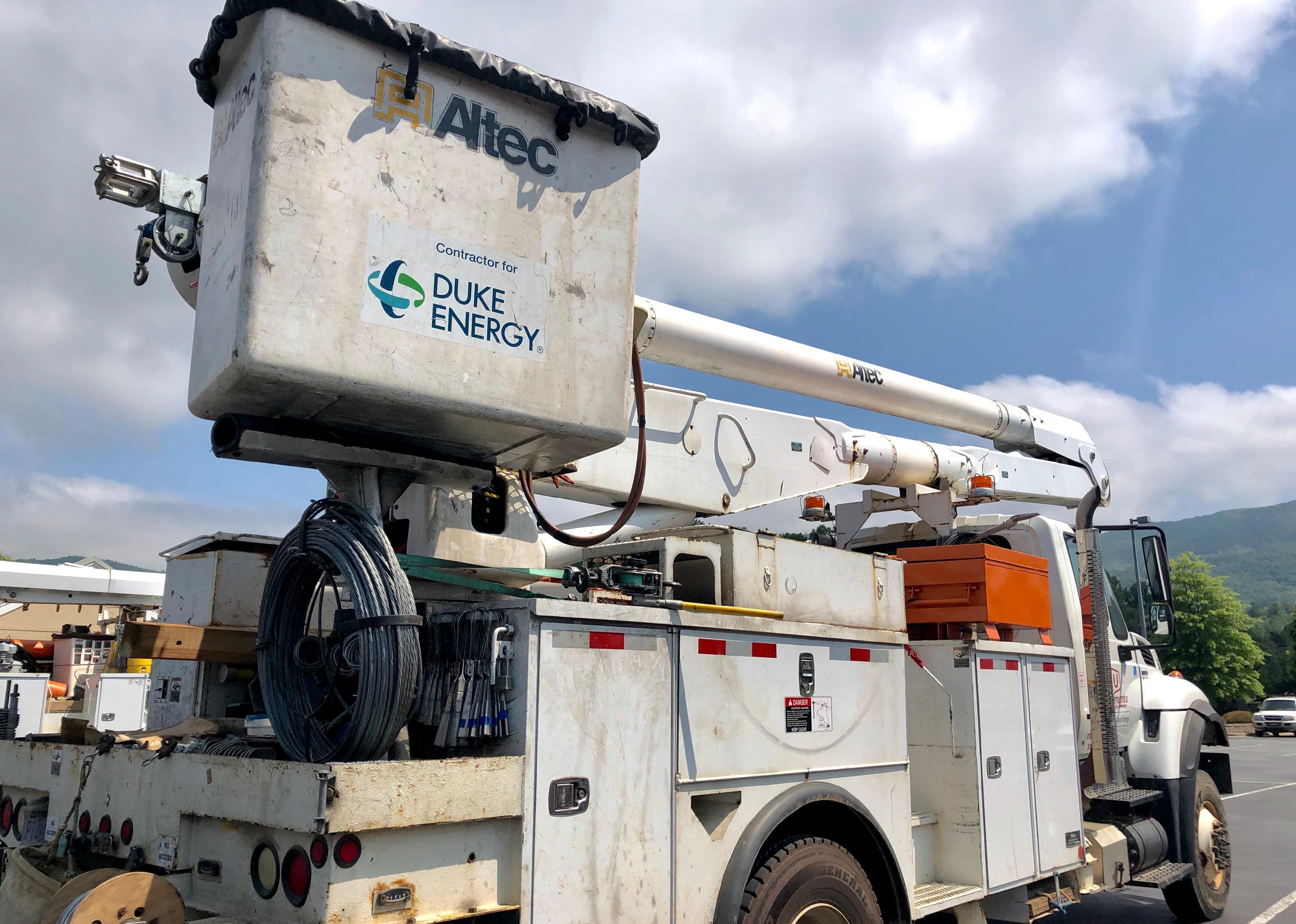 Electrical repair truck showing the logo for Duke Energy.