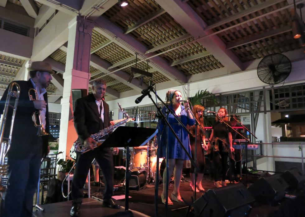 Smokestack Band plays music at Mai Tai Bar in Honolulu, Hawaii