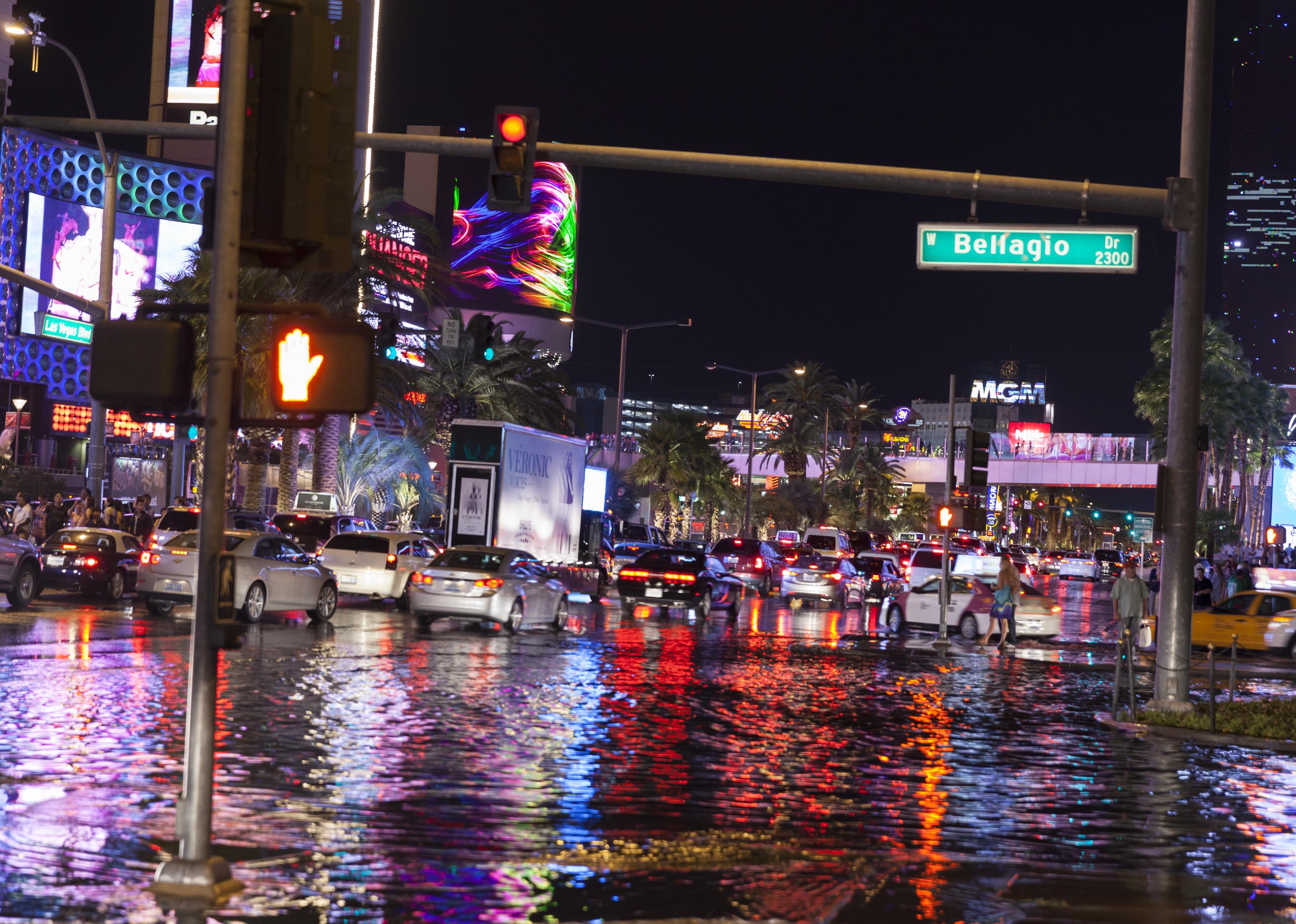 The entrance to the Bellagio under water after a storm floods the strip.