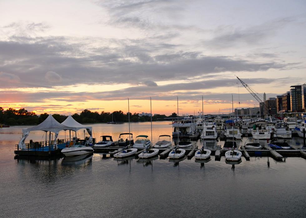 Boats docked at a jutting pier at the Southwest Waterfront.