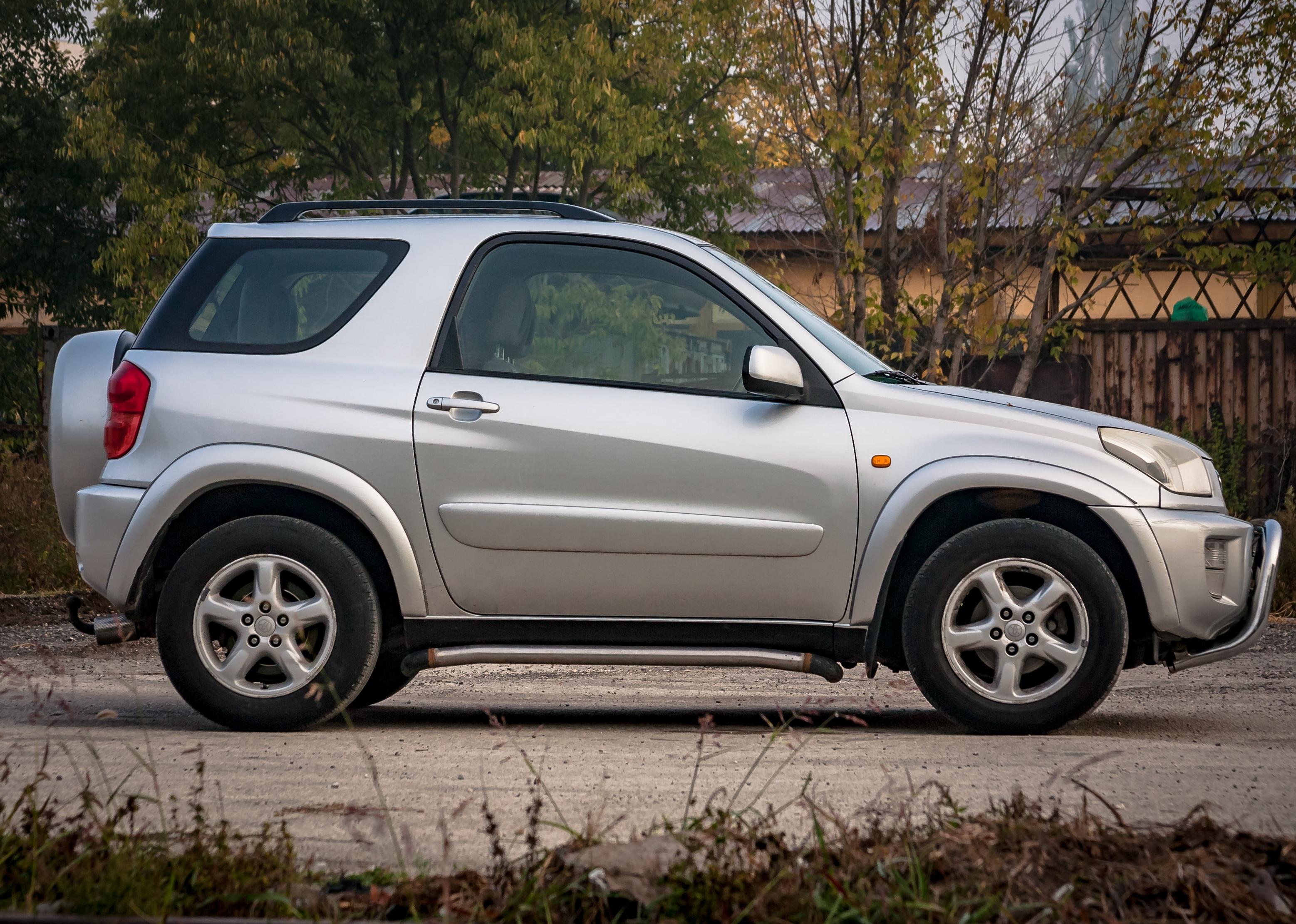 Side view of gray Toyota Rav4.