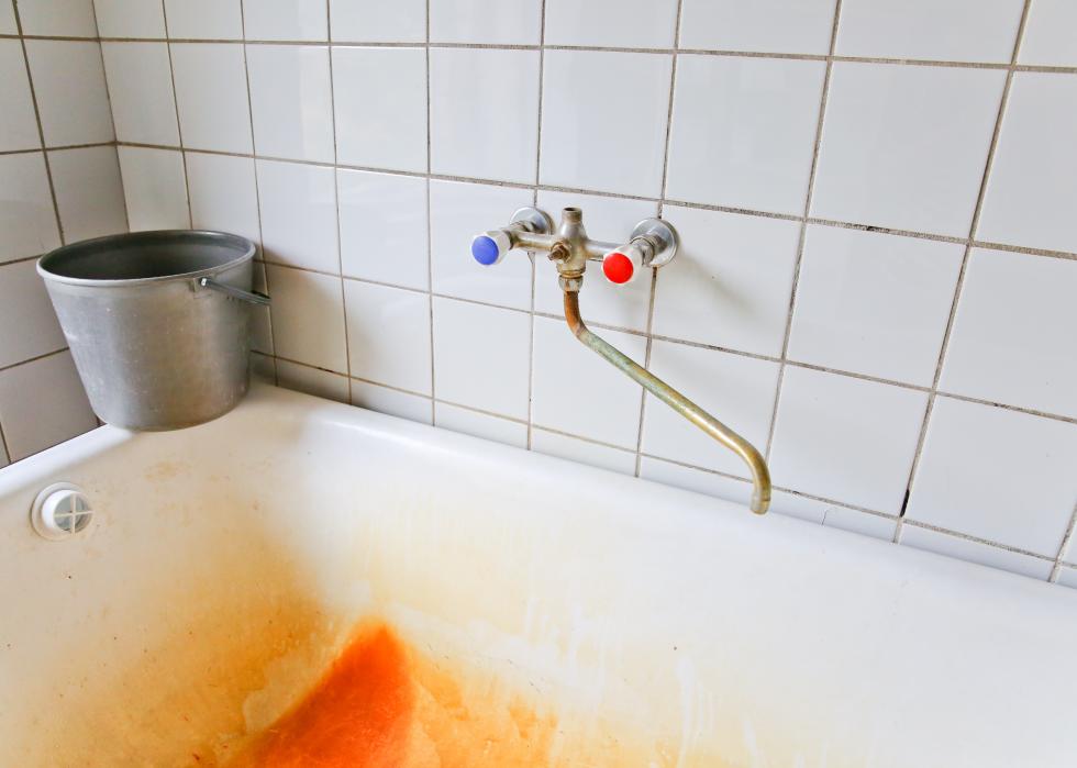 Corrosion stain in a cast iron old bathtub