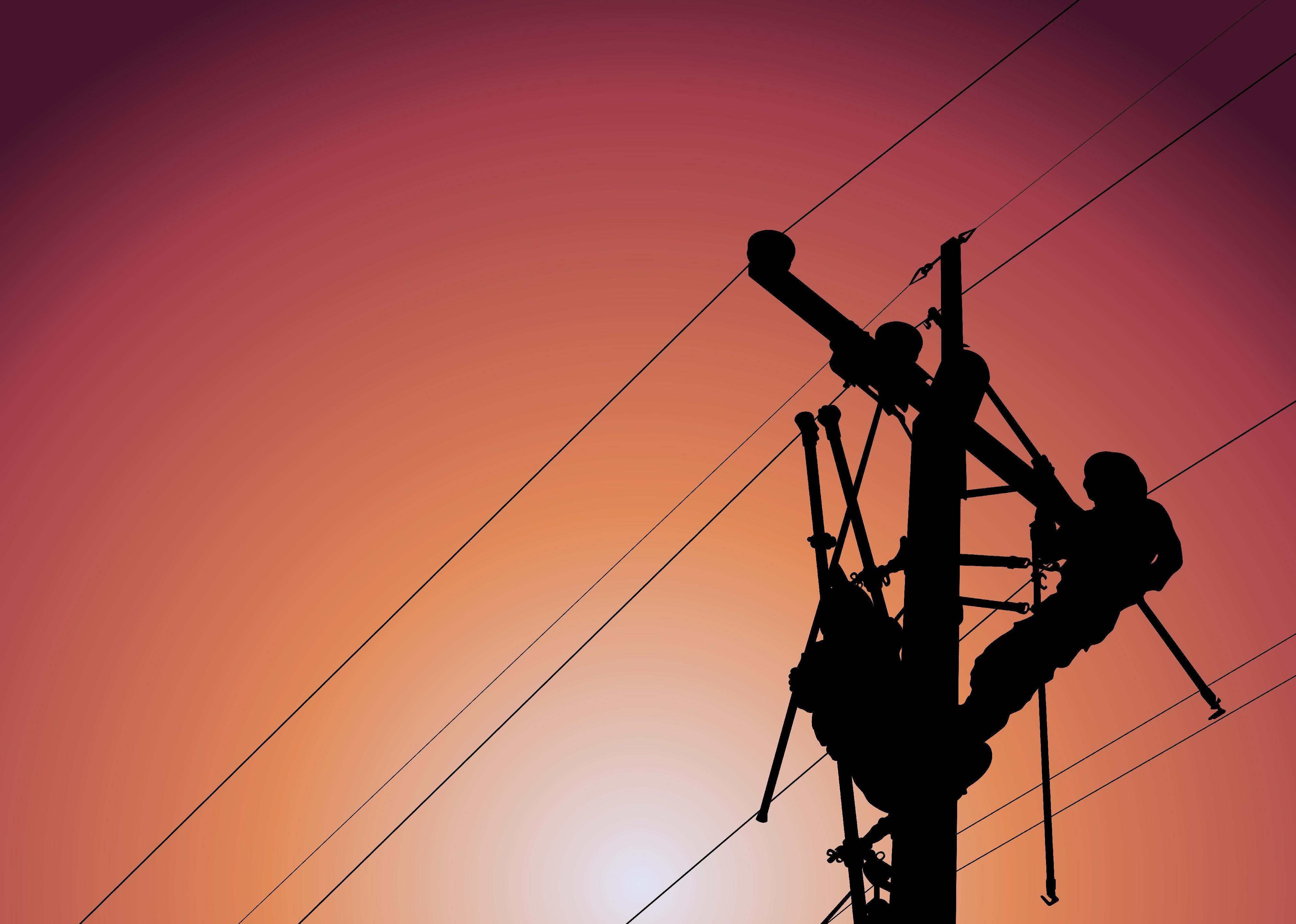 Silhouette of lineman replacing damaged insulator.