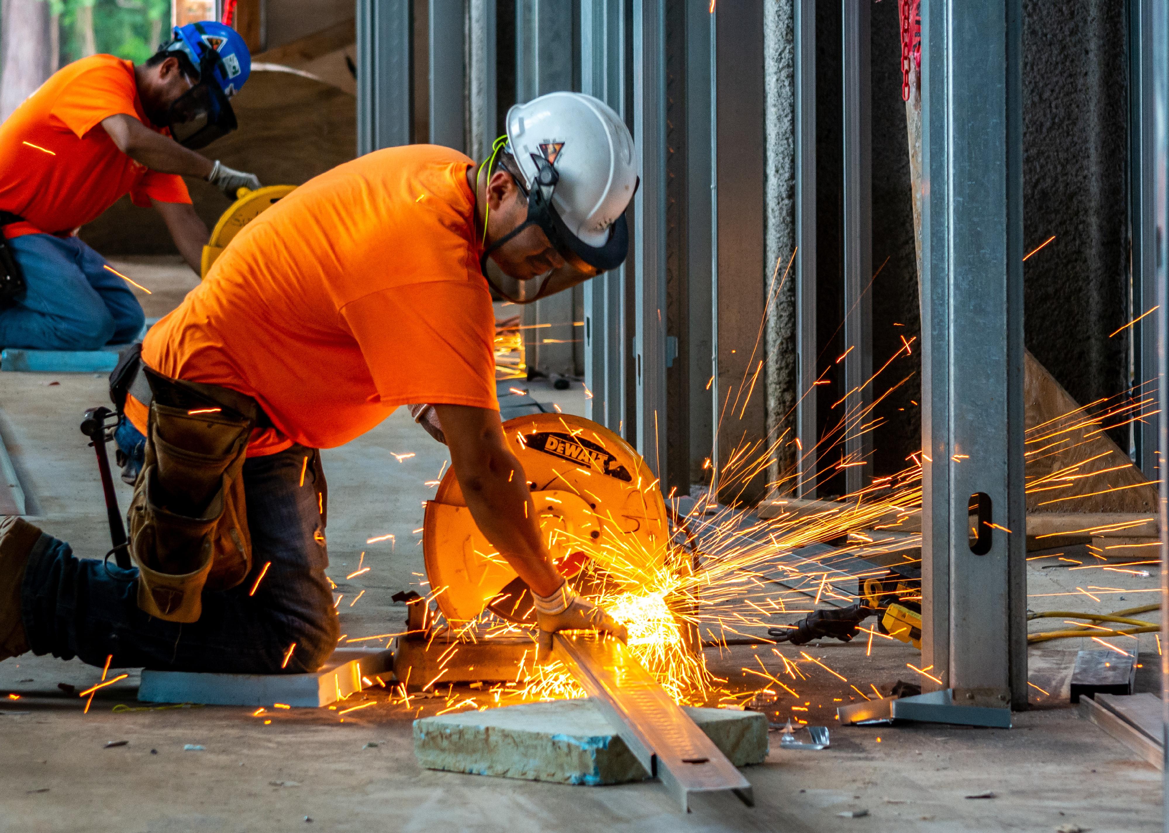 Construction workers welding