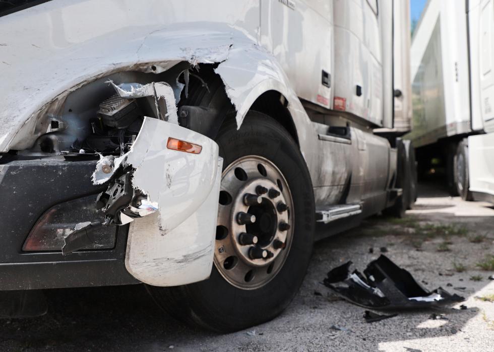 Damage closeup on white truck