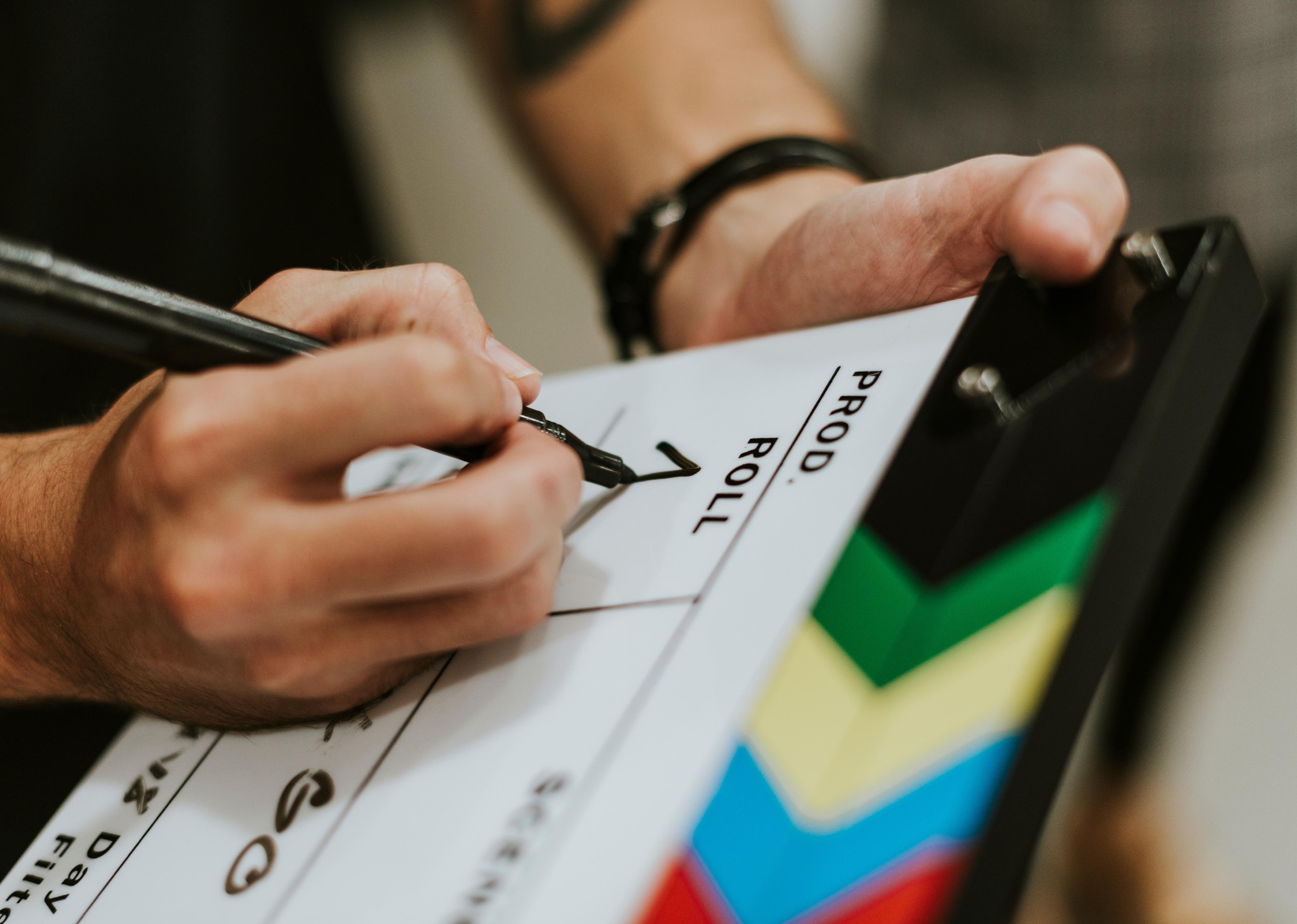 Behind the scenes close up of a clapper board.