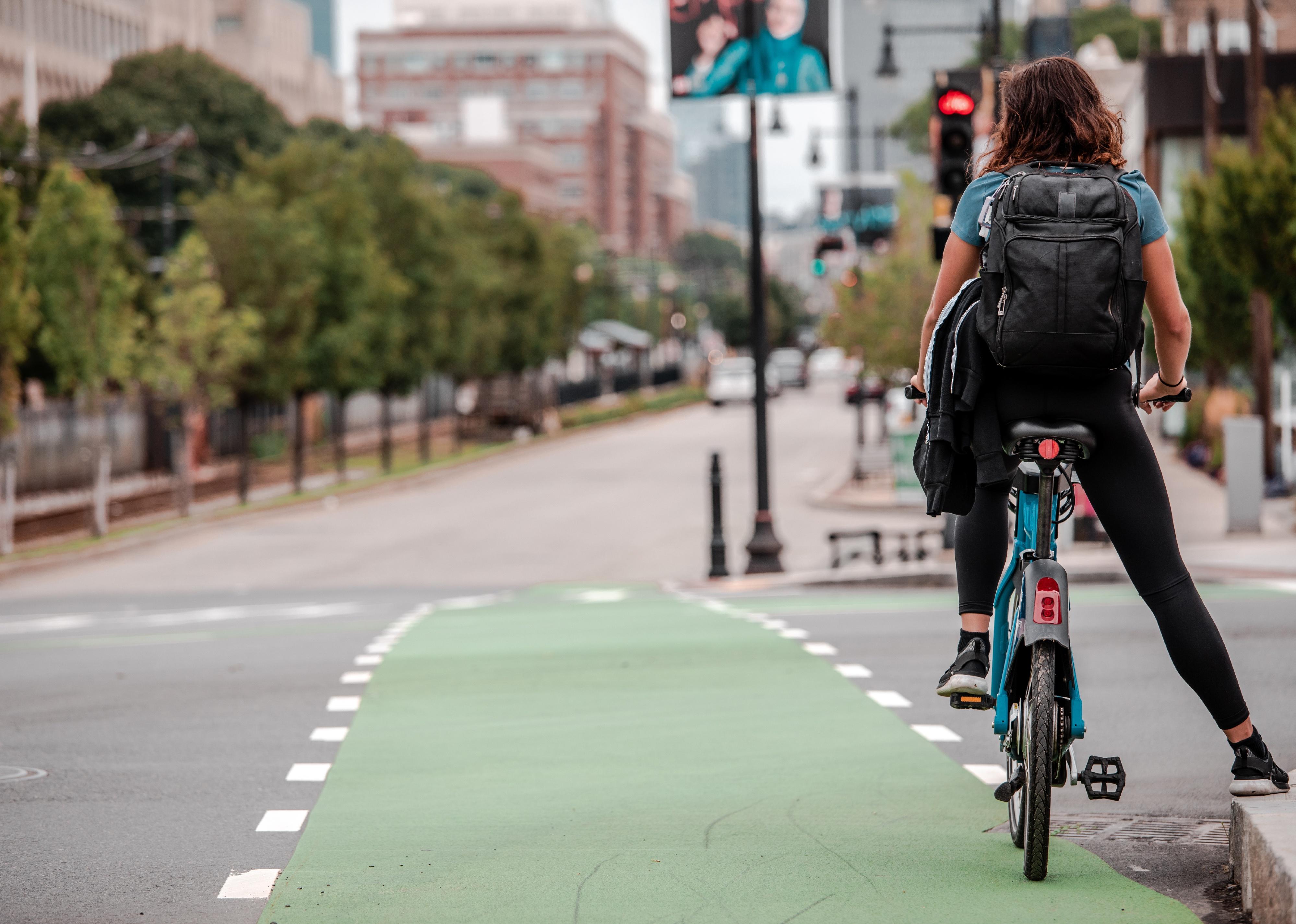 Woman on bike at Boston University in Boston, Massachusetts