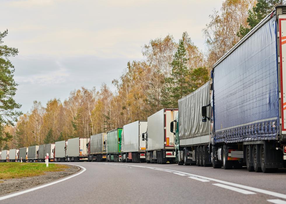 Long traffic jam of semi trucks