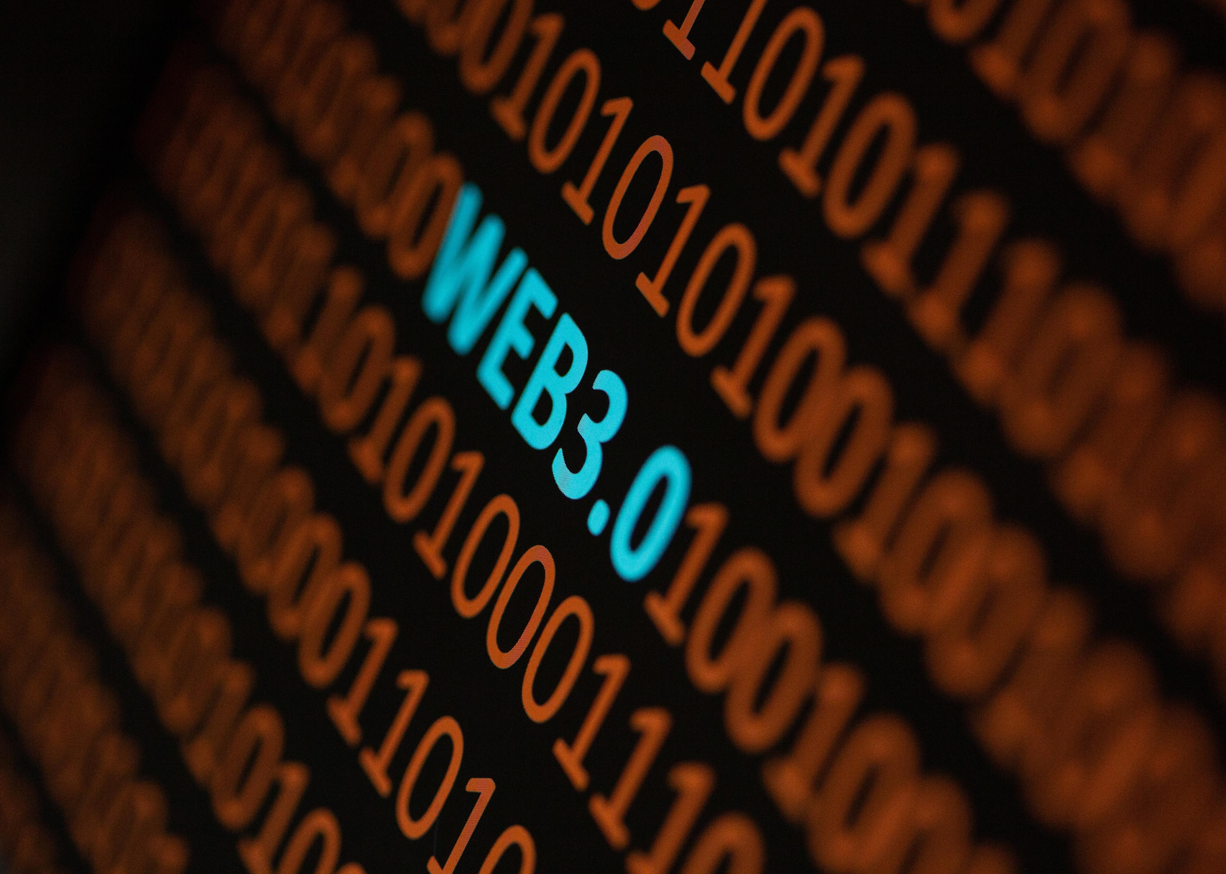 Close up of Binary codes on screen and WEB3.0 word in the middle.
