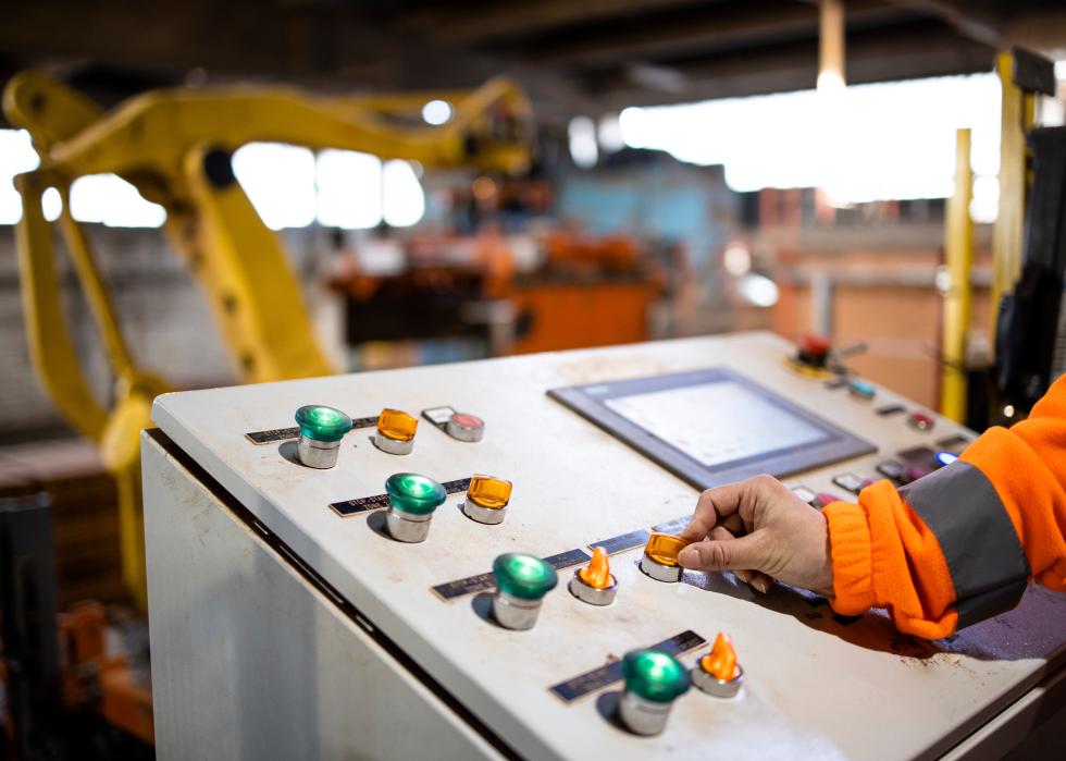 Close up of industrial control panel switchboard of manufacturing machine