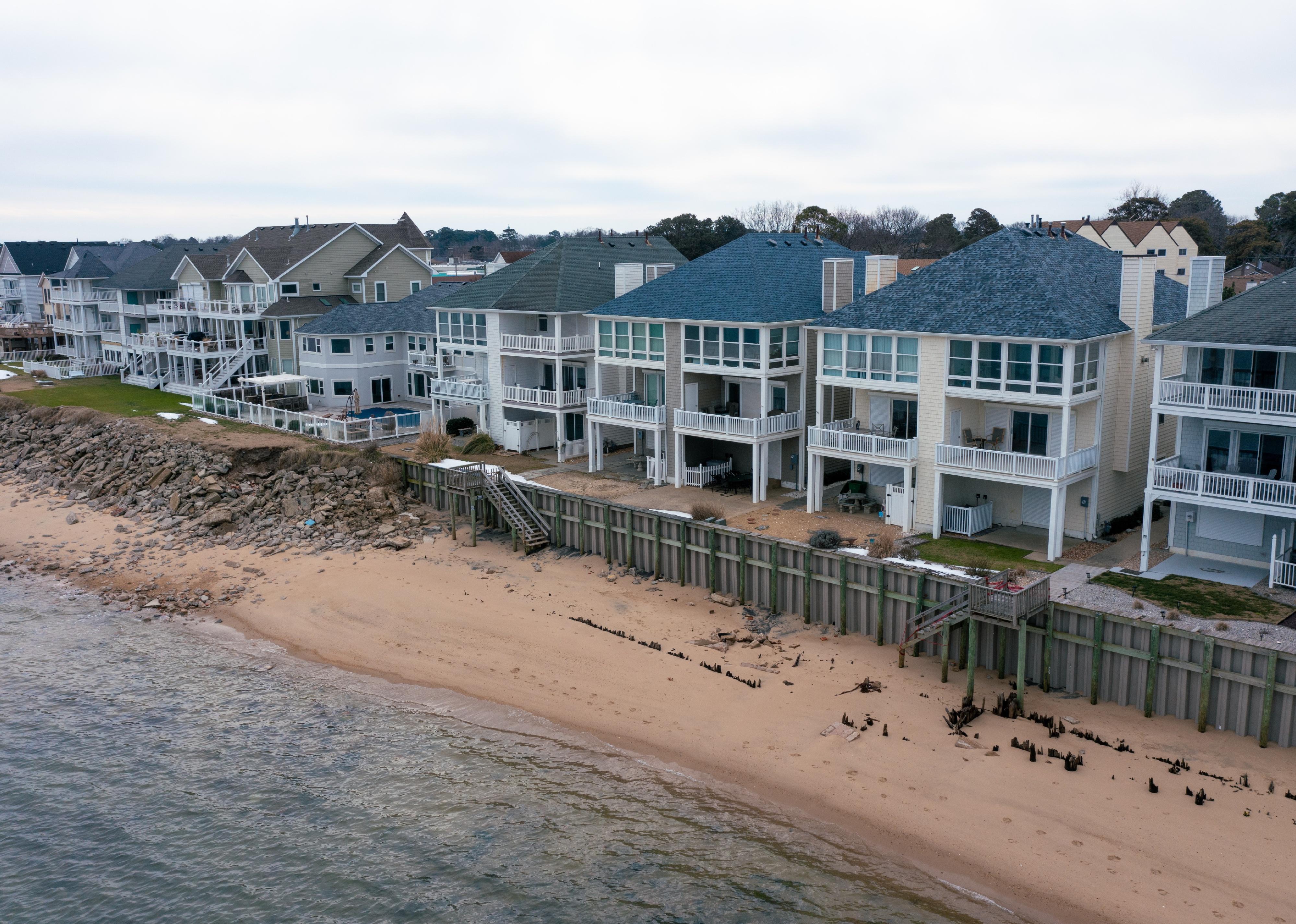 Aerial view of homes right on the shore of the Chesapeake Bay in Norfolk, Virginia.