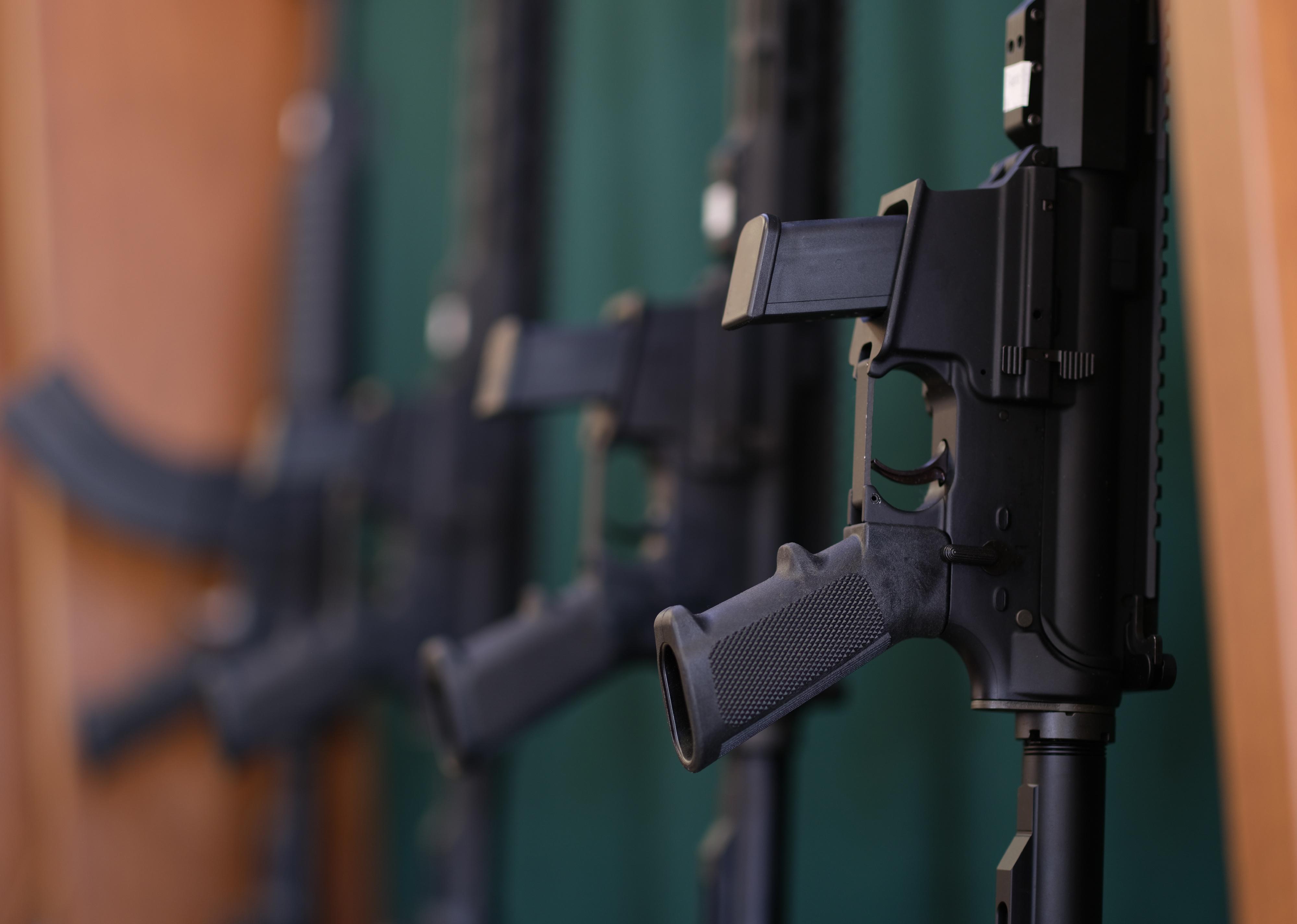 Rifles on a rack for sale. 