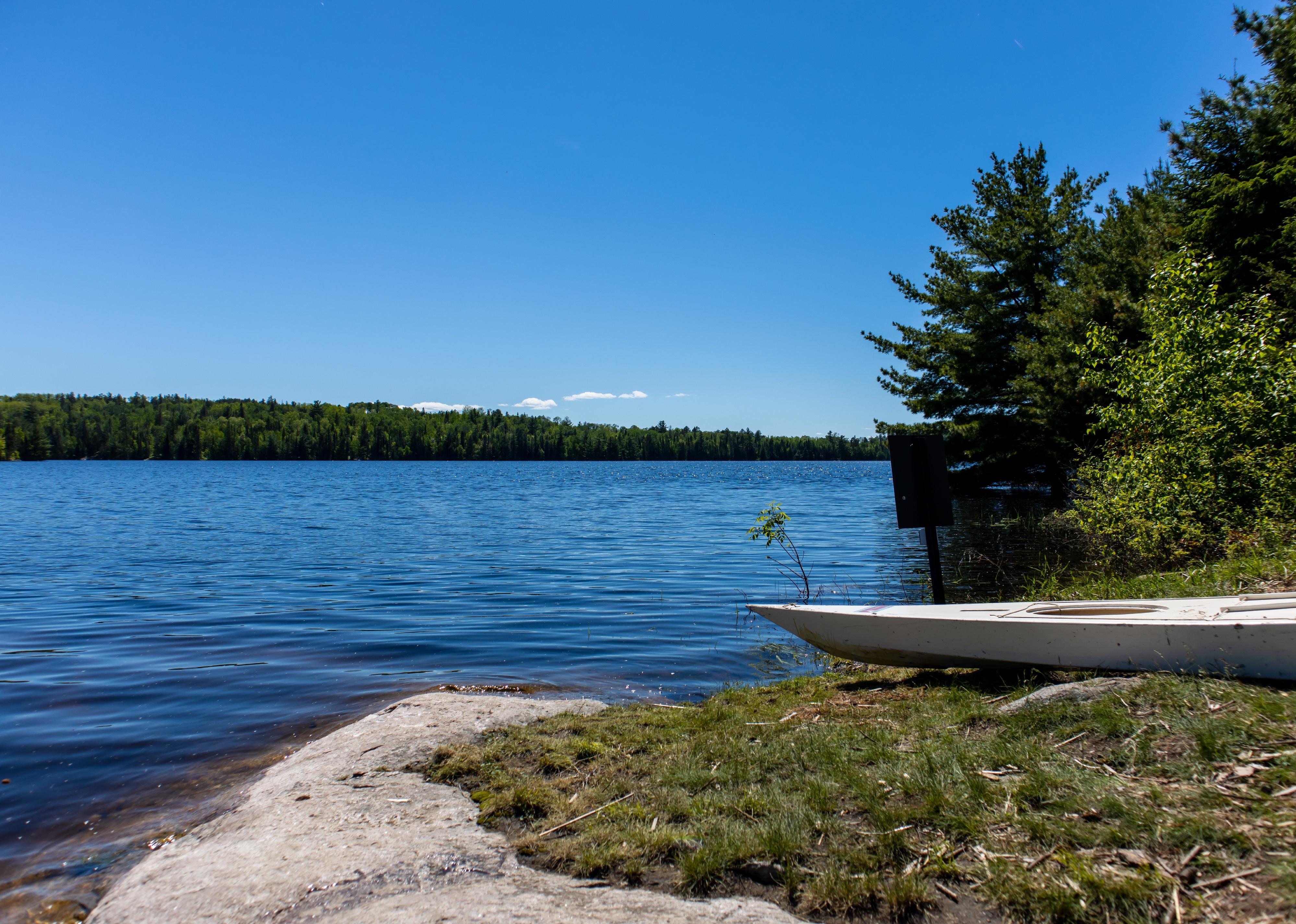 A kayak waiting on the edge of a bay at Voyageurs National Park in Minnesota.