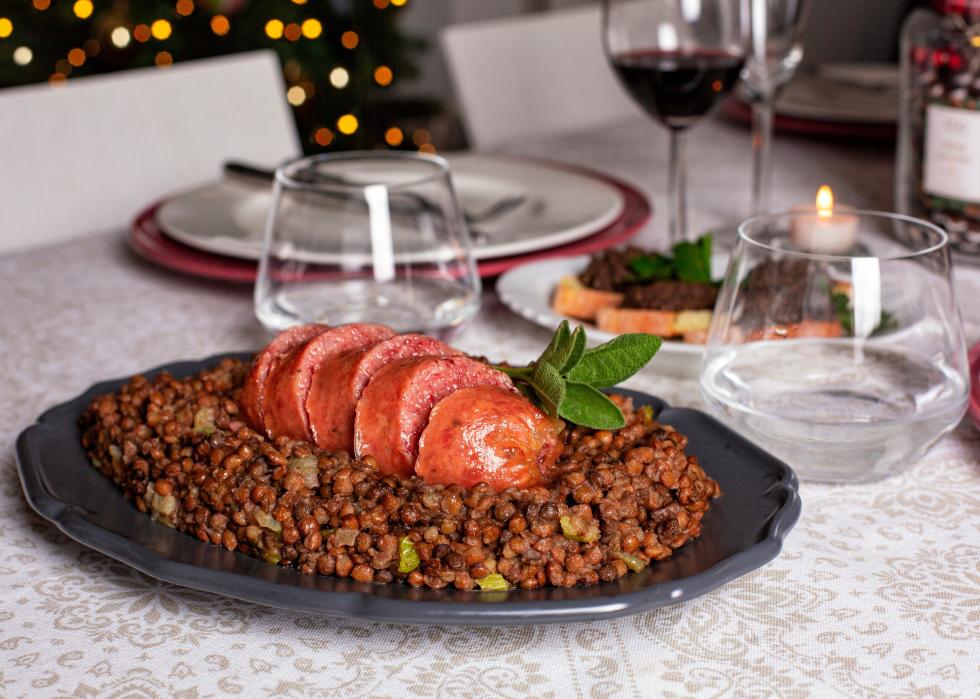 Traditional cotechino con lenticchie with vegetables.