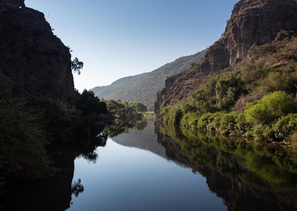 Landscape of the river and mountains in EcoAlberto Park.