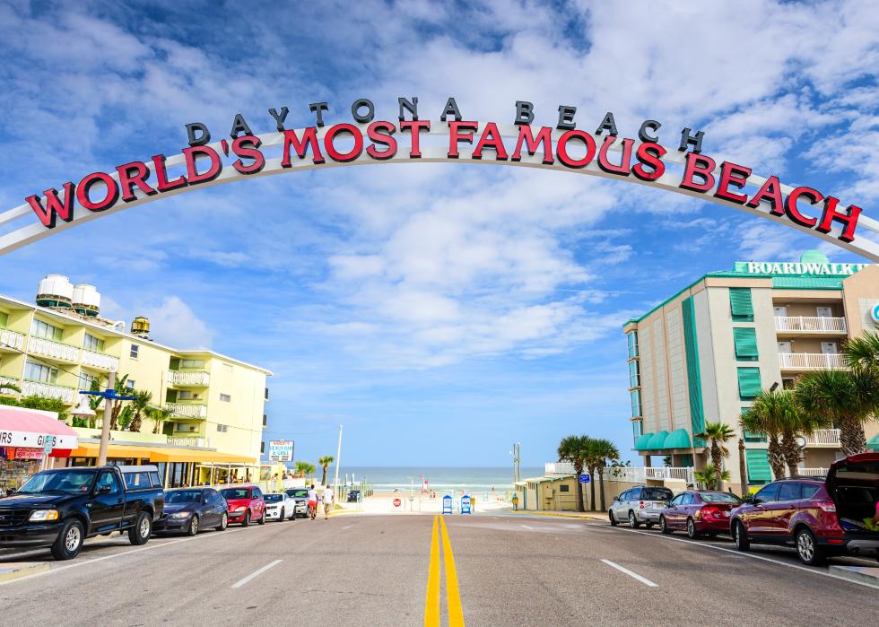Daytona beach archway sign over road.