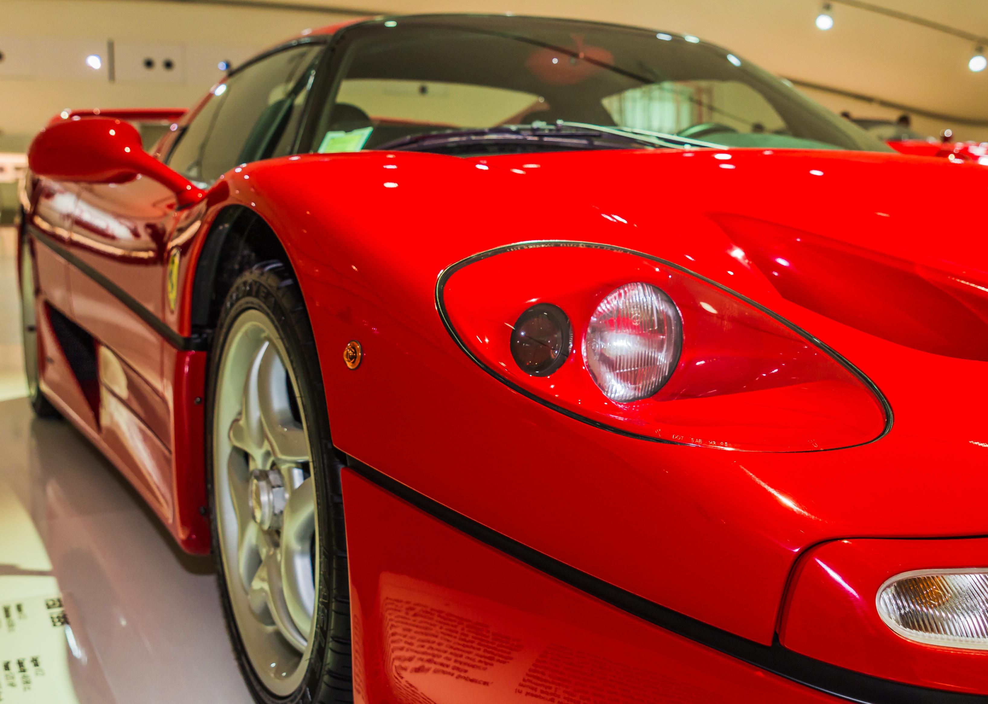 Red Ferrari F50 1995, side view. 