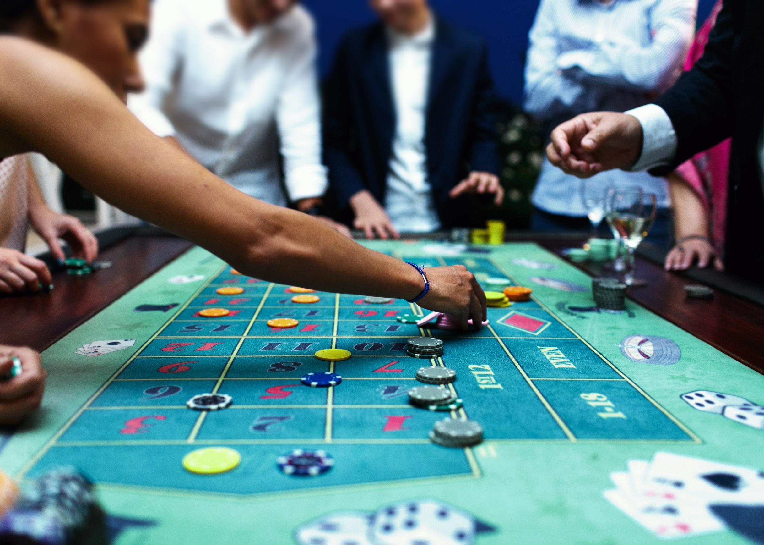 People playing roulette in the casino.