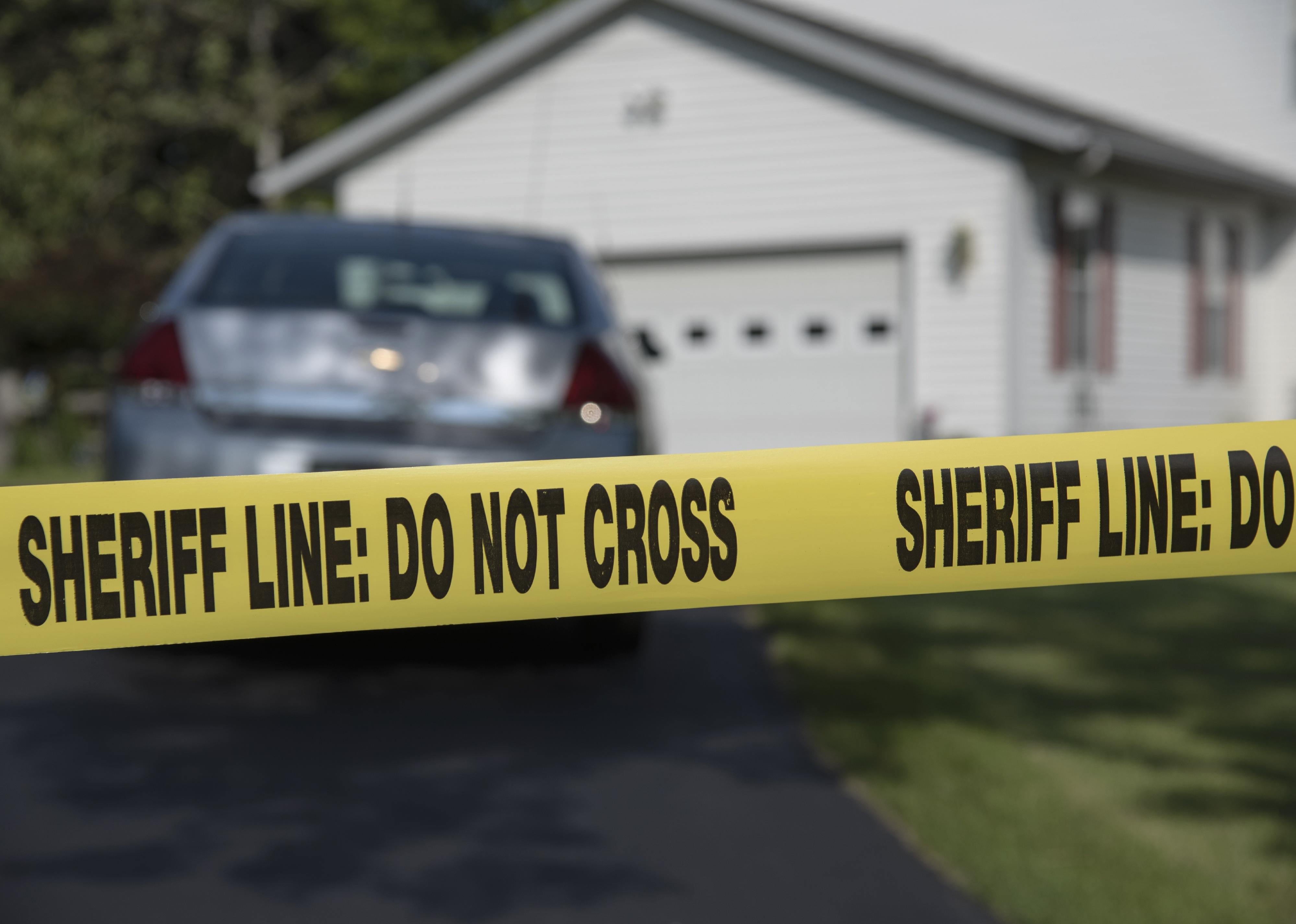 Do Not Cross tape at a crime scene.