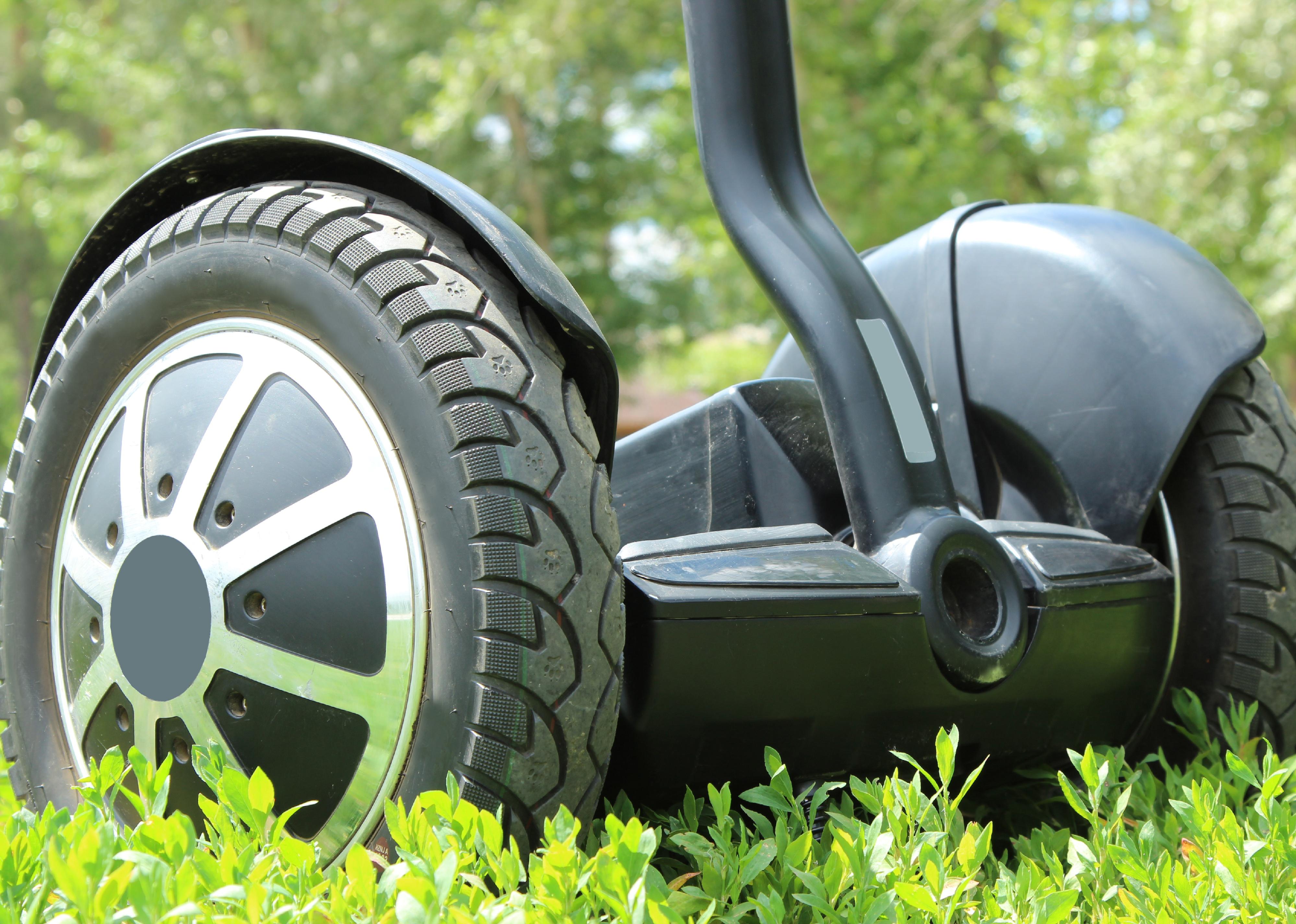 Segway on green grass.