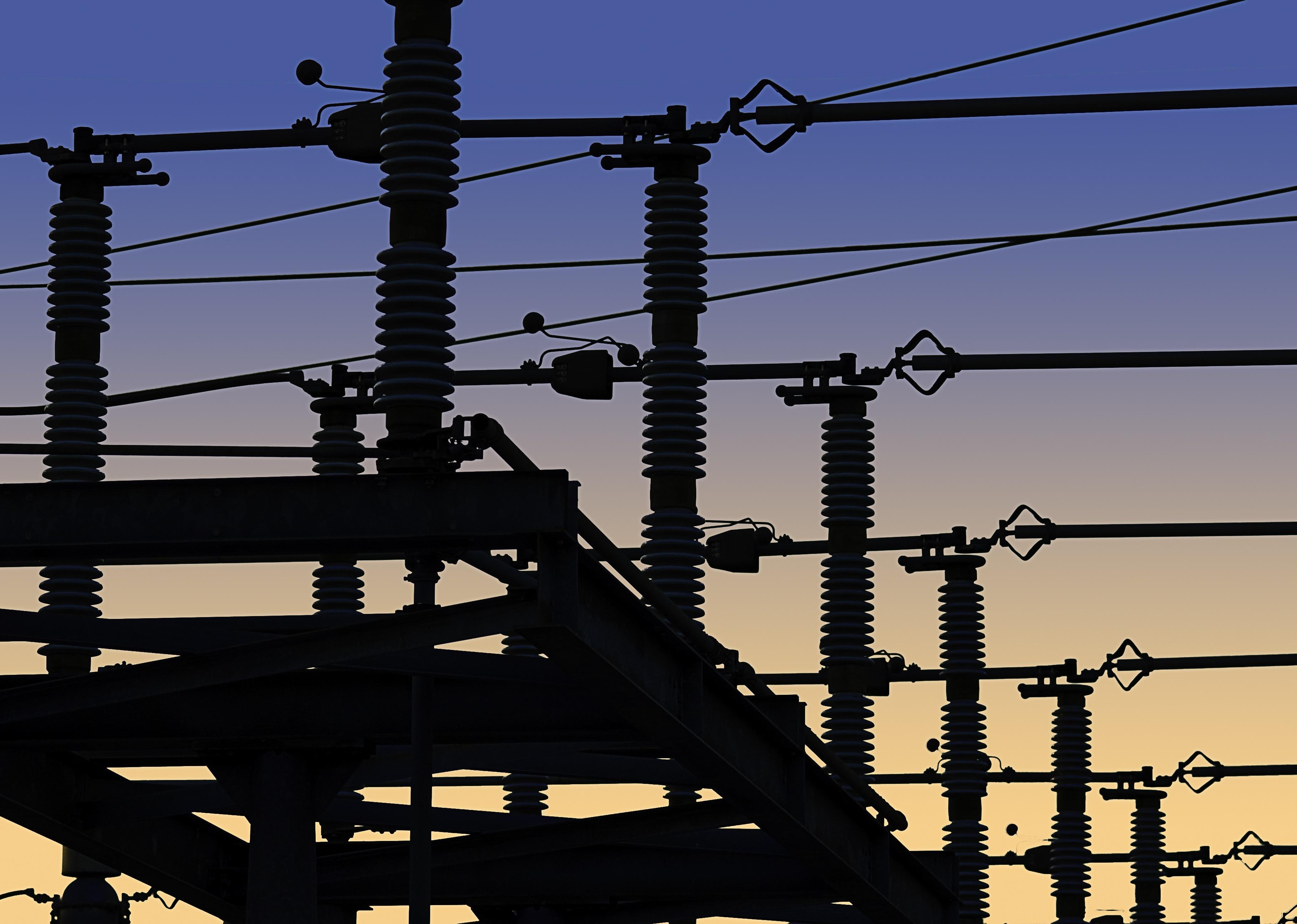 Electrical power grid in silhouette.