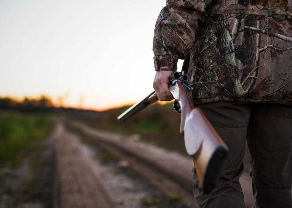 Hunter with rifle.