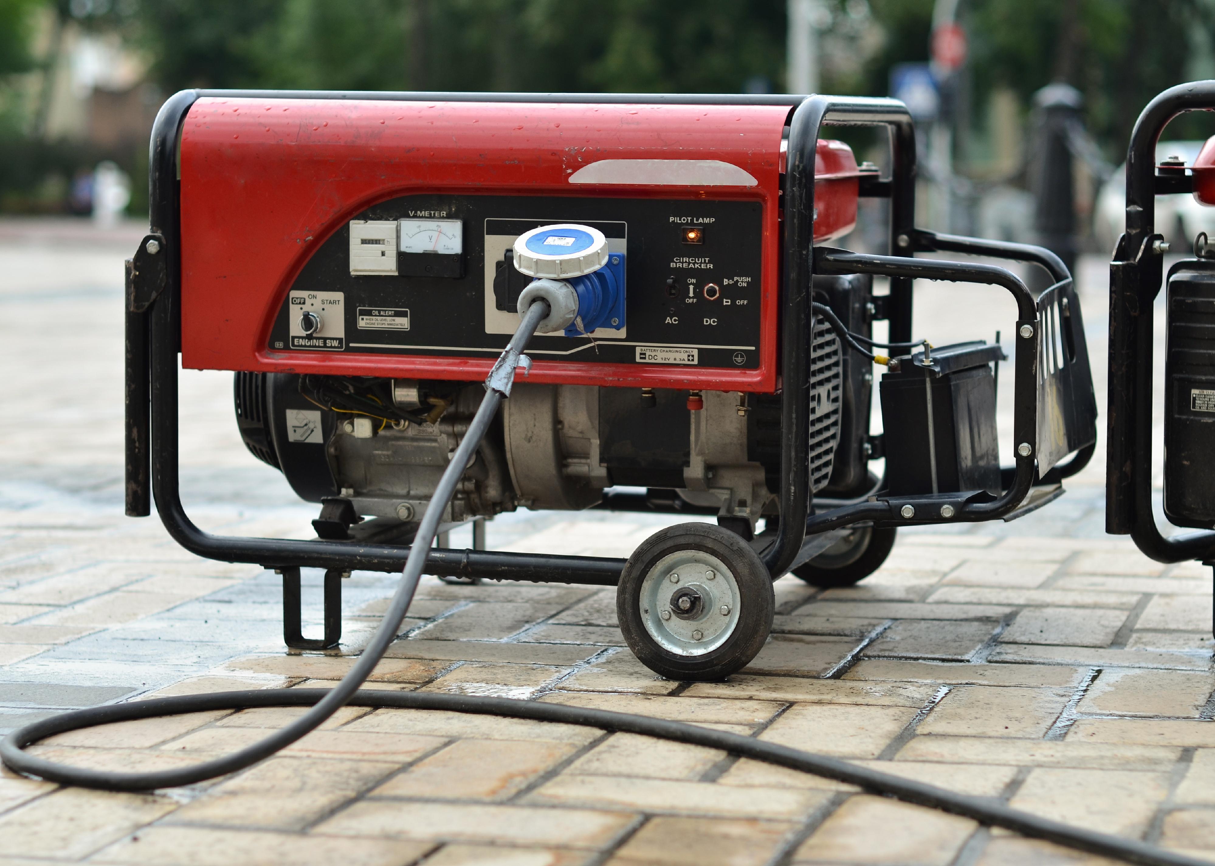 Electric generator on city street.