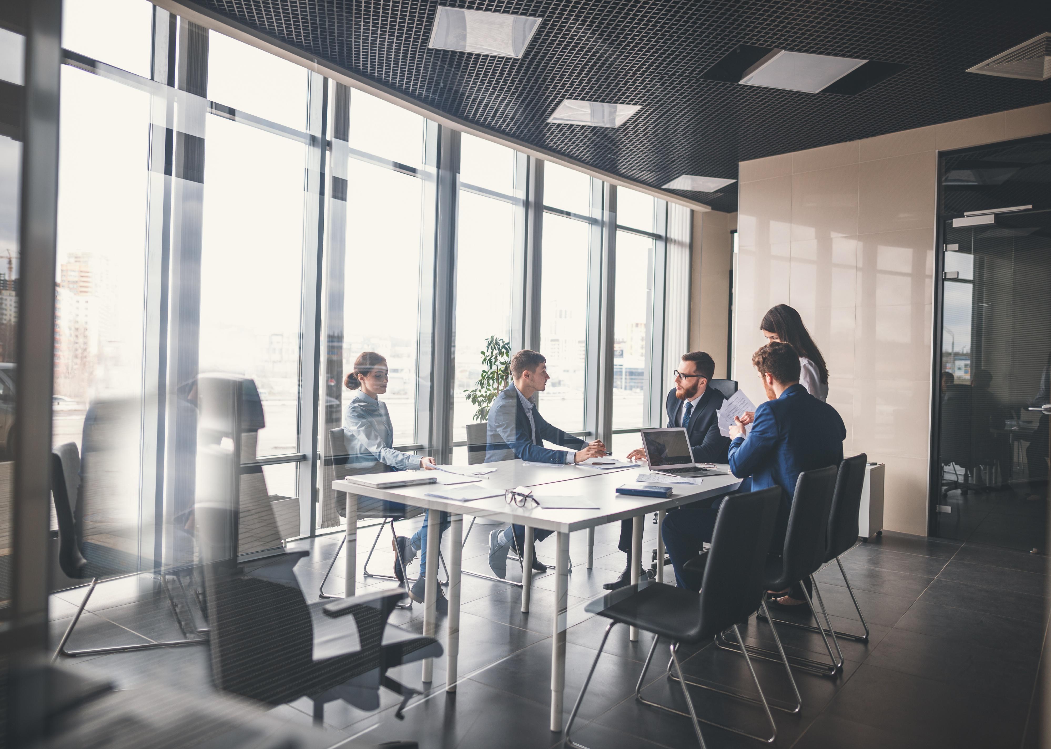 Corporate business team and manager in a meeting.