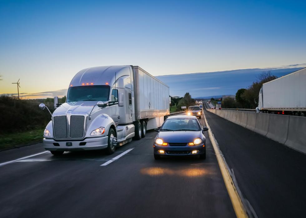 18 wheeler semi truck at night on highway
