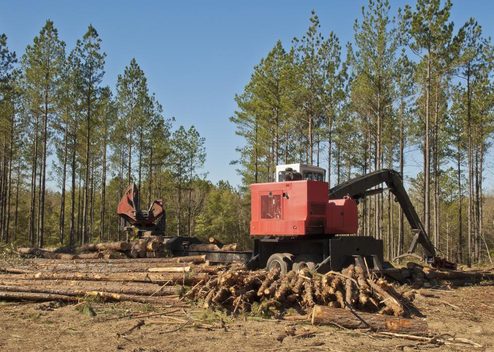 A trailer mounted log loader