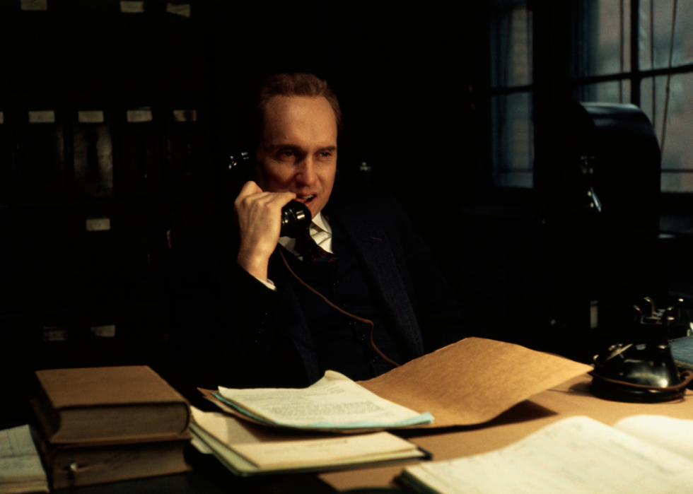 Robert Duvall at a desk in The Godfather.