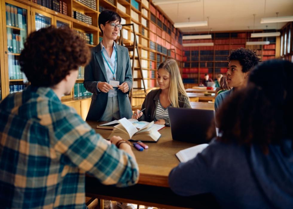 Students at a library table.