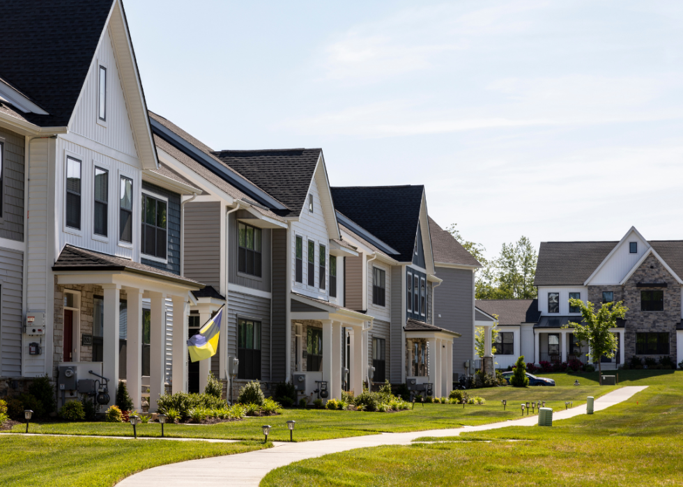 A sidewalk leading to large modern homes in North Potomac.