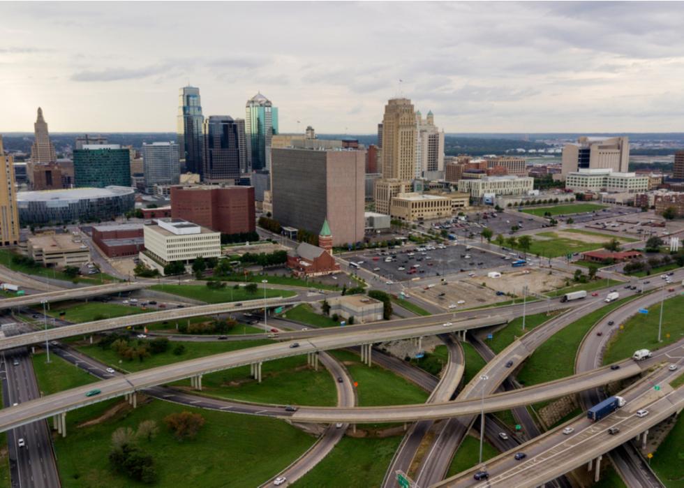 Cars and trucks driving in and out of te downtown city center of Kansas City, Missouri
