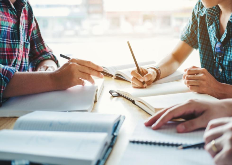 Students working in a library.