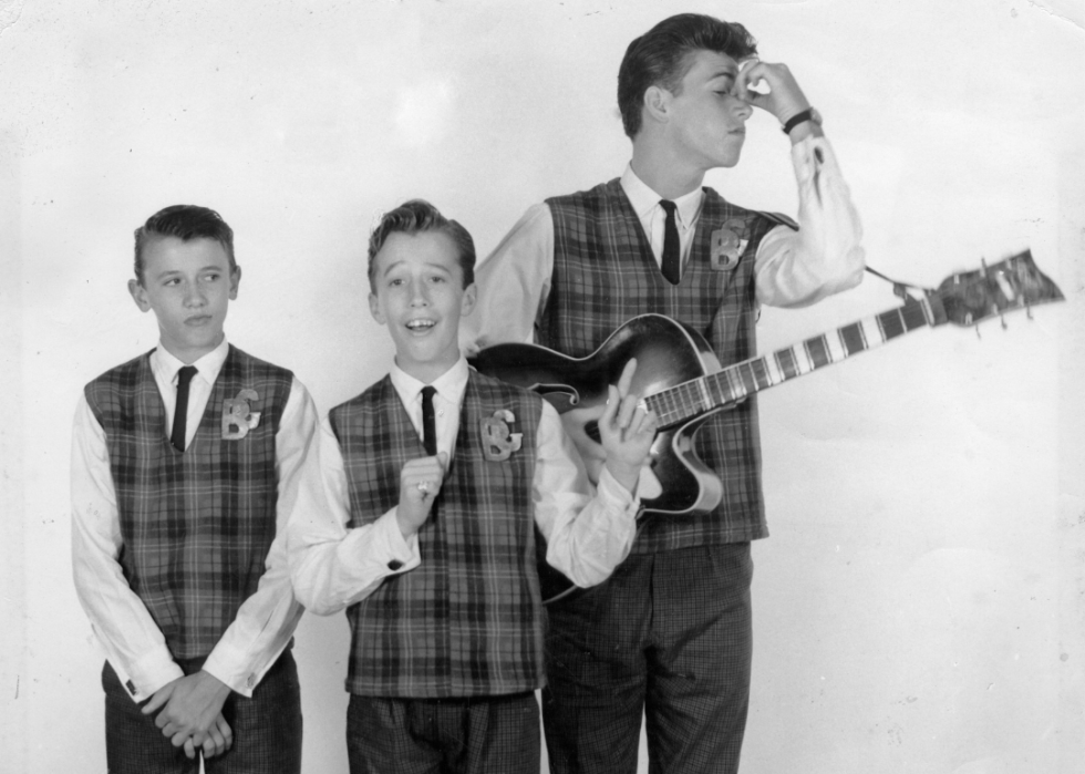 Photo of The Bee Gees posed circa 1963. Left to right: Maurice Gibb, Robin Gibb and Barry Gibb.