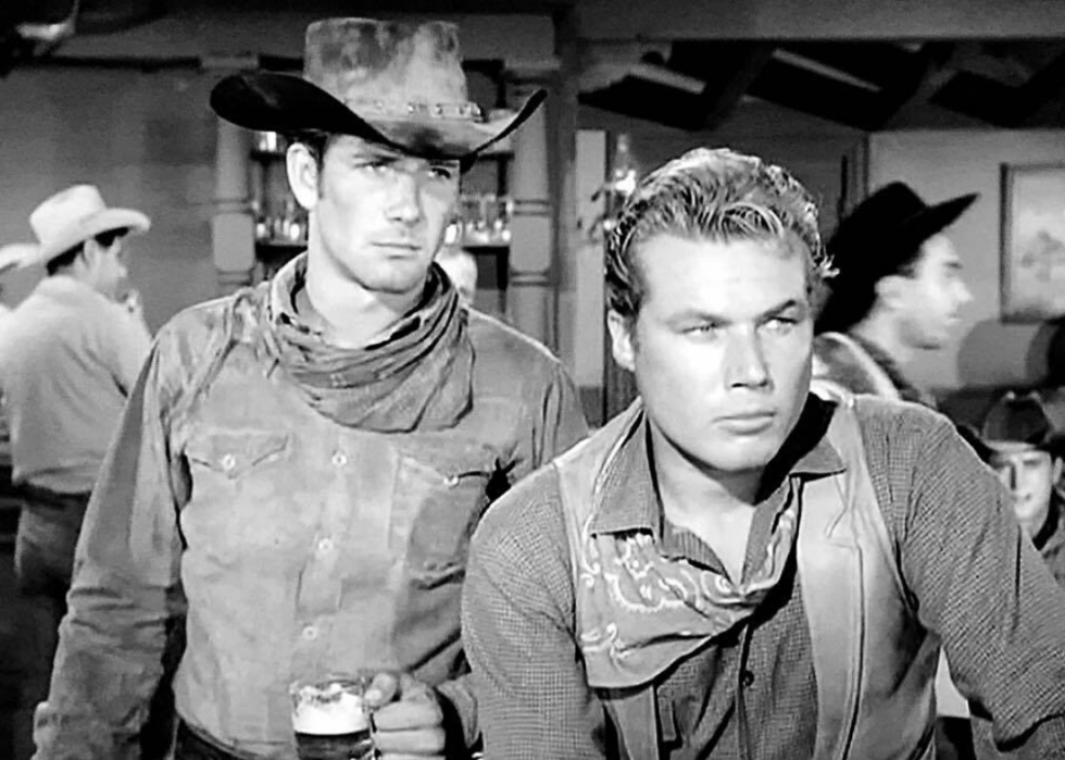 Two cowboys in a saloon.