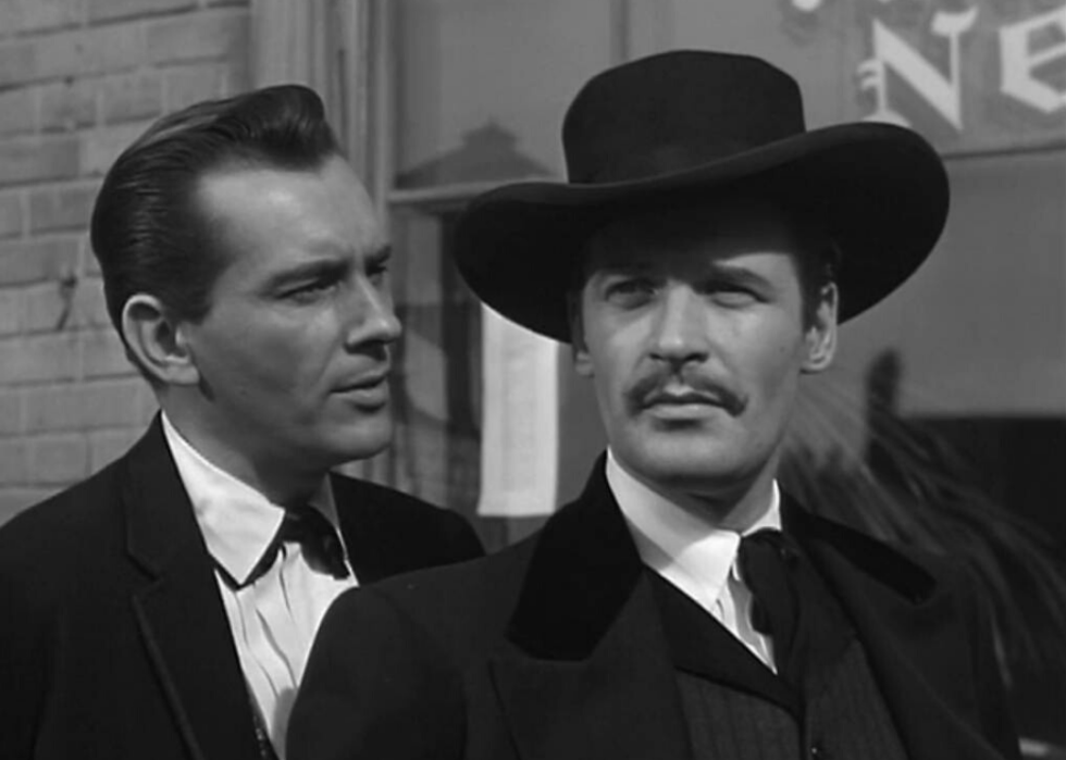 Two men in dark suits.