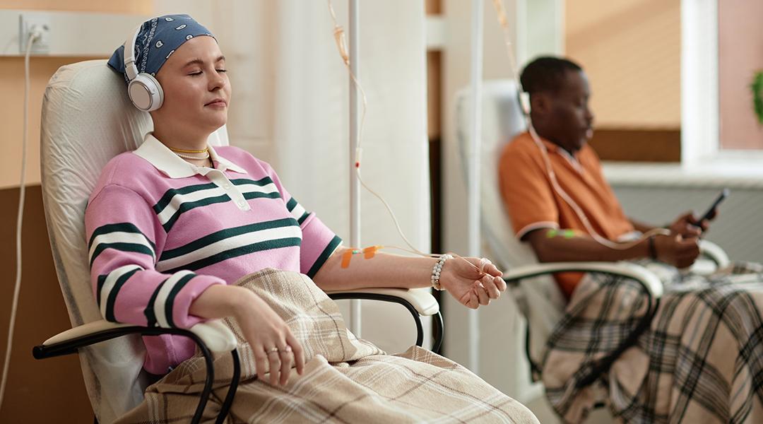 Chemotherapy patients listening to music during a treatment session.