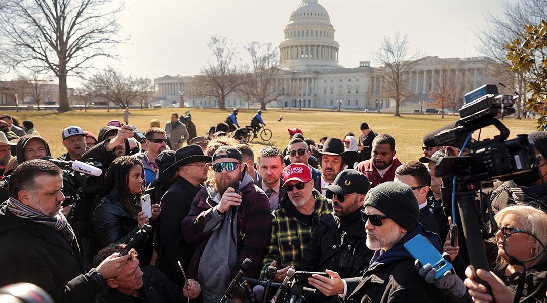 Members of the far-right group the Proud Boys, including their former leader Enrique Tarrio, Stewart Rhodes, Joe Biggs, Ethan Nordean and Zach Rehl speak to journalists on the east side of the U.S. Capitol, Feb. 2025.