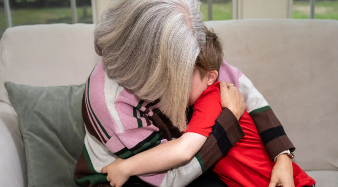 Terri Joyce hugging her son.