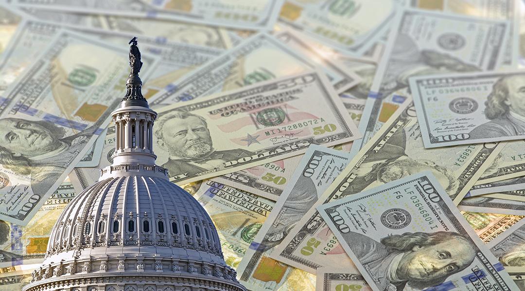 A collage of the United States Capitol dome with a background of US dollar banknotes.