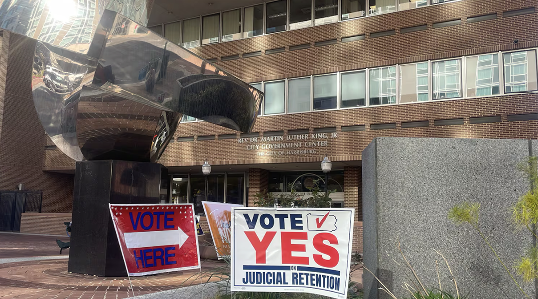A sign urging voters to vote yes on judicial retention outside a polling place in Harrisburg, Pennsylvania, on Election Day.